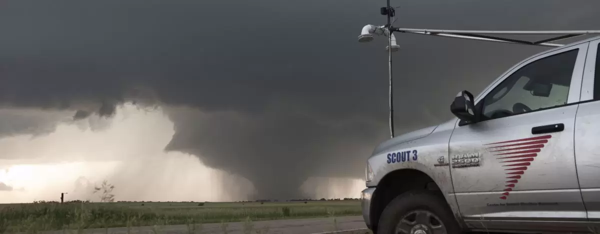 Scientists from the Center for Severe Weather Research studying a storm in Oklahoma