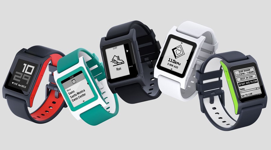 Various models of Pebble smartwatches displayed in a lineup